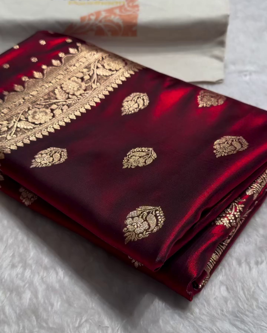 Maroon Banarasi Satin Saree with Golden Zari Floral Weaving
