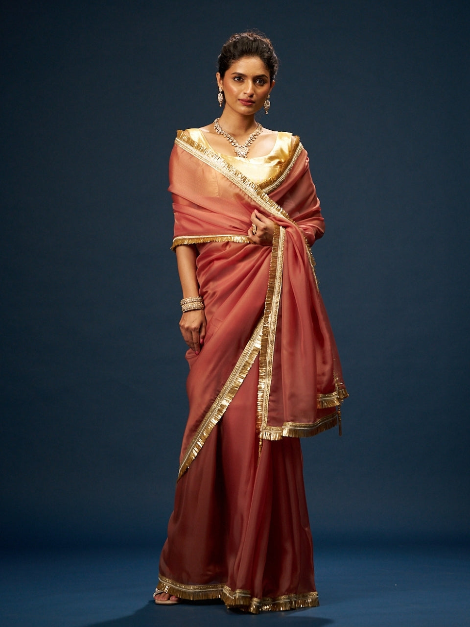 Burnt Orange Satin Saree with Zari Lace & Latkan