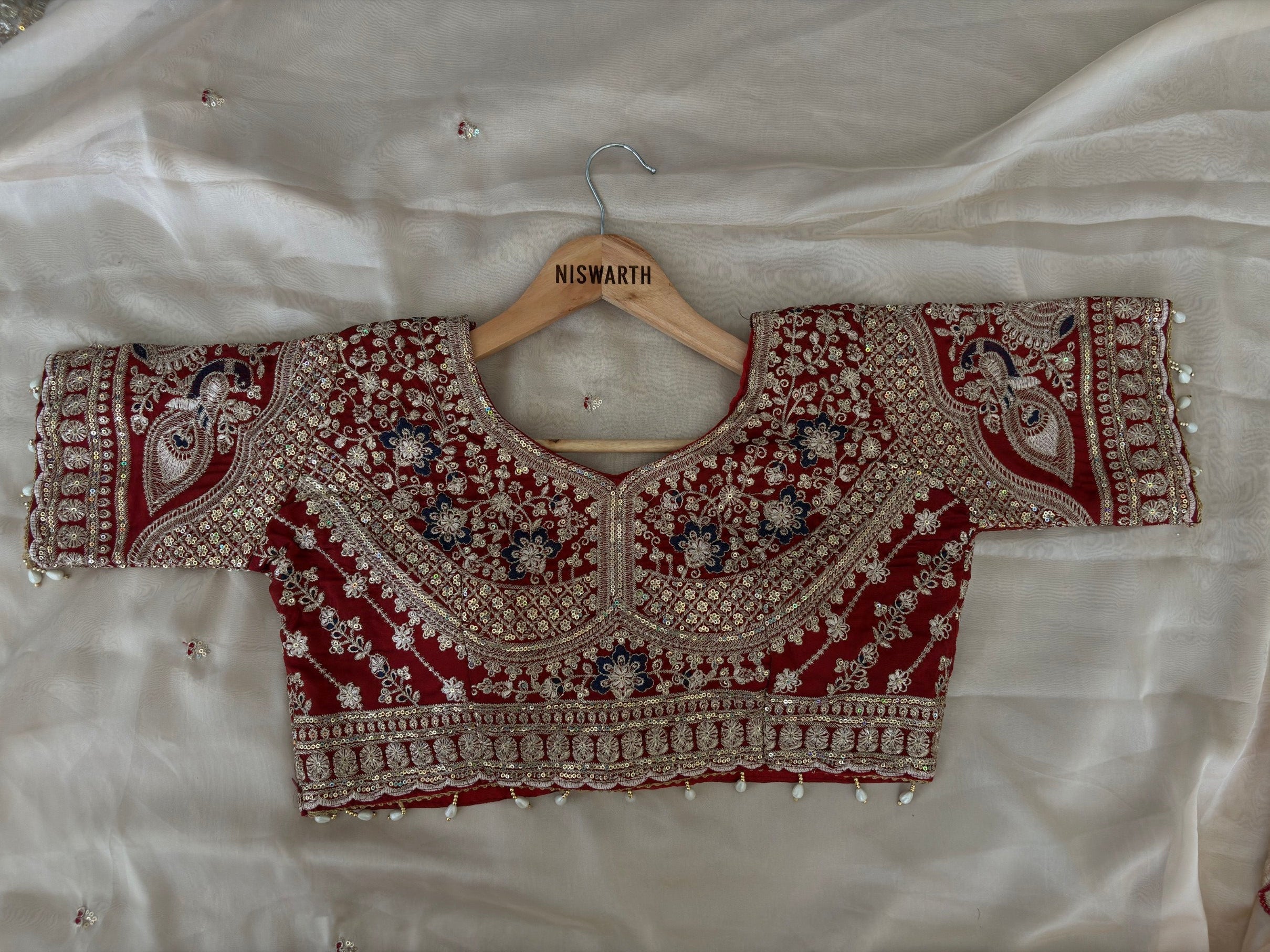 Ivory White Designer Saree with Maroon Embroidered Blouse