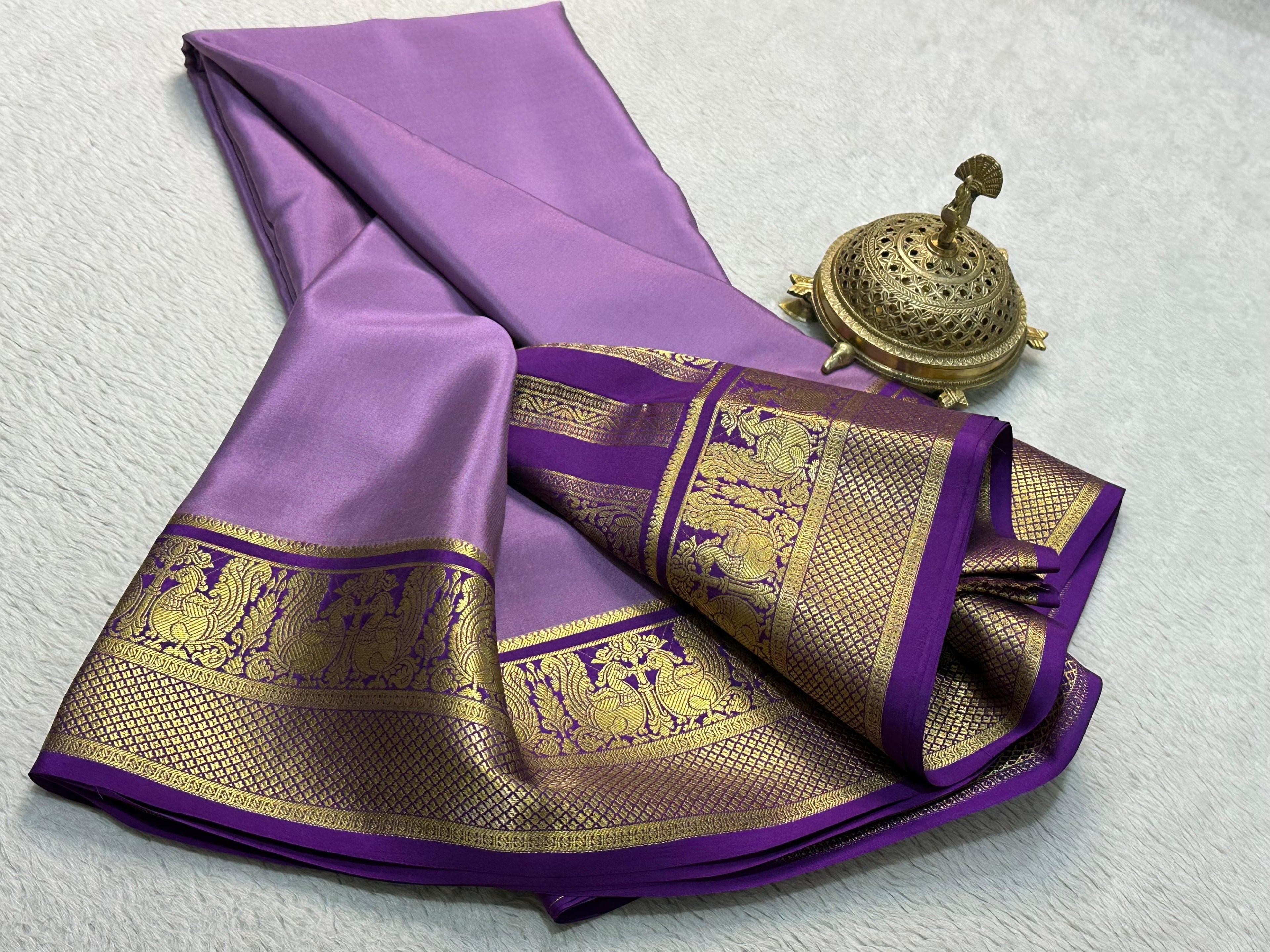 Grace the Occasion with Our Enchanting Rich Peacock Border Sarees
